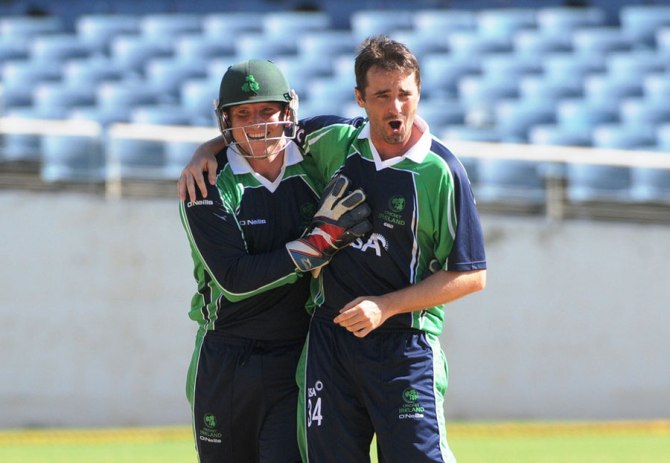 Murtagh (right) finished with figures of 4-32 off 10 overs